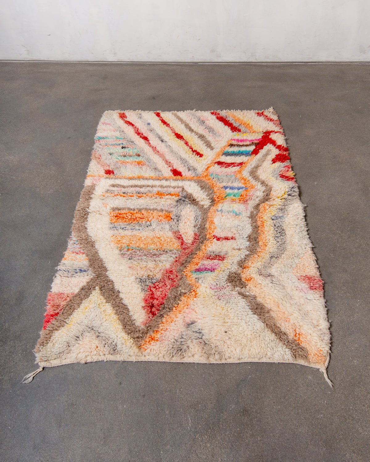 Modern, designer, handcrafted Berber rug from Morocco. Vintage carpet with beautiful colours and patterns and fluffy texture.